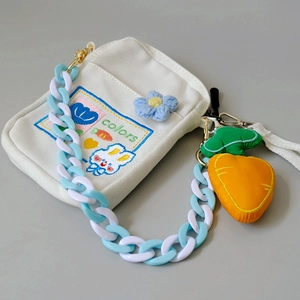 White canvas crossbody bag with blue resin chain and cute bunny embroidery detail