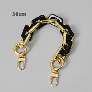 Detaillierte 30 cm lange Taschenkette aus schwarzem Acryl und Goldmetall mit Karabinerhaken
