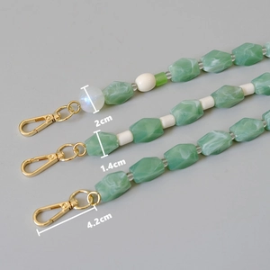 Colorful handmade beaded bag strap with green marble beads and golden metal clasps