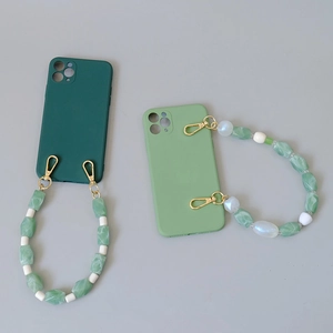 Green silicone phone cases with colorful vintage handmade resin beaded hand chains