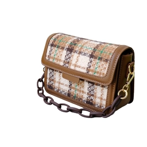 Vintage colorblock plaid crossbody bag with brown resin chain and flap closure