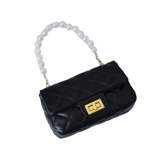 Vintage black quilted leather handbag with white pearl handle and gold rotary lock