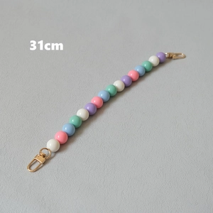 Detail of 31cm colorful resin bead chain with gold lobster clasps and candy color beads