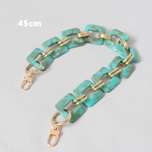 Detail of 45cm green marble resin chain links with gold metal rings for handbag
