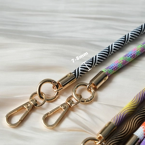 Fashionable crossbody cell phone lanyard strap with colorful woven patterns and gold metal clips