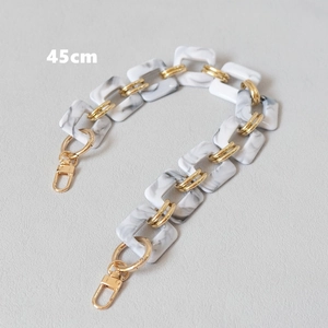 Detail view of 45cm vintage marble acrylic chain strap with gold metal rings and lobster clasps