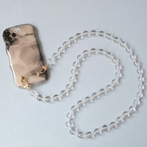 Detail of wave-edge phone case with transparent candy-colored acrylic bead strap