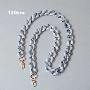 Detail of 120cm acrylic bag chain strap with marble texture links and gold clasps