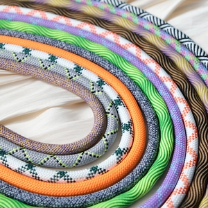 Macro shot of colorful braided crossbody phone straps with premium texture and patterns