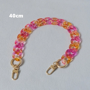 Detail view of 40cm gradient acrylic resin bag chain with gold lobster clasps