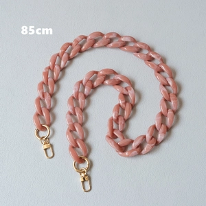 Detailed view of 85cm marbled acrylic resin bag strap with golden swivel metal hooks