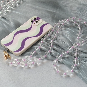 Detail of clear acrylic beaded long strap with purple waves phone case and gold hooks