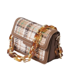 Vintage plaid crossbody bag with brown leather trim and amber acrylic resin chain strap