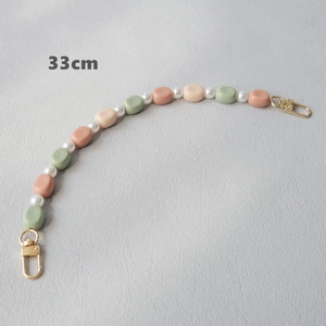 Detail of 33cm acrylic bead strap with Morandi colors and gold lobster clasps