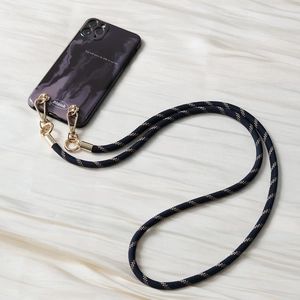 Detail of purple marble phone case with dark blue and gold woven crossbody strap