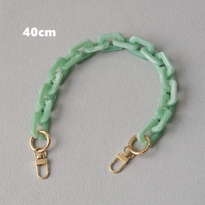 Detail view of 40cm light green marble acrylic chain strap with gold metal spring clasps