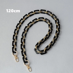Detail of 120cm black resin and gold metal chain strap with swivel lobster clasps
