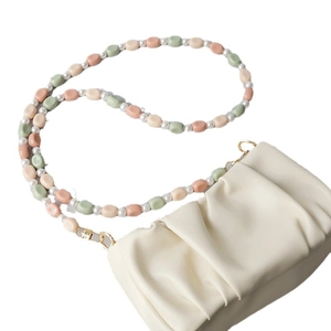 Beige ruched cloud bag with colorful acrylic resin bead and pearl crossbody strap