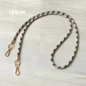 Close-up of 120cm multi-color woven phone strap with gold lobster clasps and grid texture