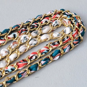 Golden chain strap with floral silk scarf detail for elegant handbags and shoulder bags