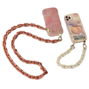 Pink and peach acrylic resin phone chain straps with wave-edged cases and gold metal hooks