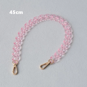Detailed view of 45cm pink acrylic chain strap with gold metal lobster clasps for bags