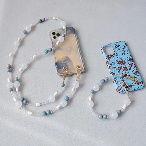 Acrylic bead mobile strap set with marble textured phone cases and golden lobster clasps