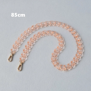 Detail of 85cm retro fishbone acrylic chain with orange marble texture and gold lobster clasps