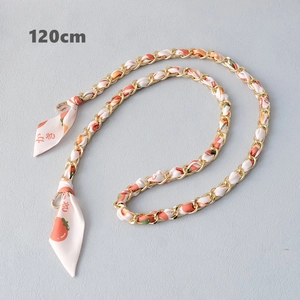 Detailed 120cm gold chain strap with pink silk scarf featuring orange persimmon print