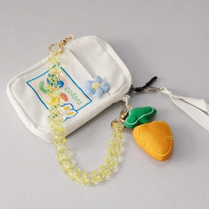 Sac en toile blanc avec chaîne en résine acrylique jaune et breloque carotte
