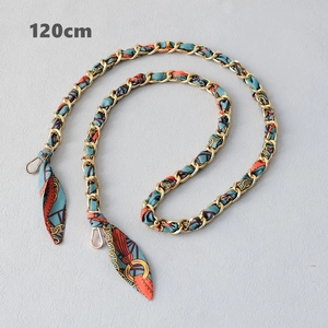Detail of 120cm gold chain strap with silk scarf weave and lobster clasps for handbags