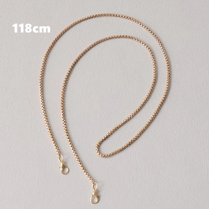 Detailed view of 118cm gold box chain strap with durable lobster clasps for handbags
