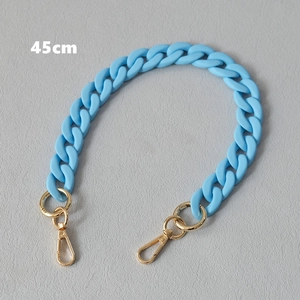 Detail of 45cm light blue acrylic chain strap with gold clasps for handbags