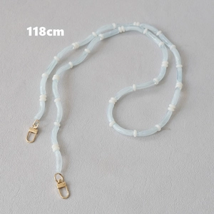 Detail of 118cm light blue acrylic bamboo bead strap with golden lobster clasps
