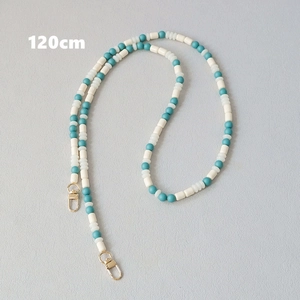 Detail view of 120cm colorful acrylic beaded strap with gold lobster clasps and clear spacers