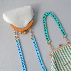 Retro kiss-lock bags with wood frames and colorful acrylic chunky chain straps in macaron colors