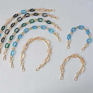 Fashionable acrylic link bag chain with gold metal finish and lobster clasps
