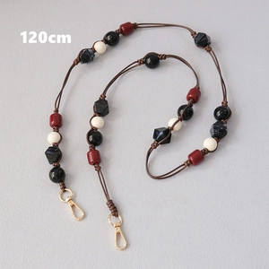 Detail of 120cm beaded shoulder strap with colorful acrylic beads and golden lobster clasps