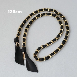 Detail of 120cm gold metal chain interwoven with black silk ribbon for handbags