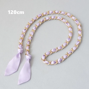 Detail of 120cm light purple silk ribbon interwoven with golden metal bag chain strap
