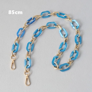 Detail view of 85cm blue acrylic and gold metal chain strap with lobster clasps