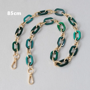 Close-up of 85cm replacement handbag chain with gold metal rings and dark green acrylic links