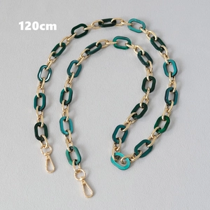 Close-up of 120cm chain strap with green acrylic links and gold metal lobster clasps