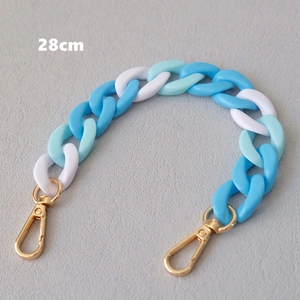 28cm blue and white resin fishbone phone chain with gold lobster clasps detail