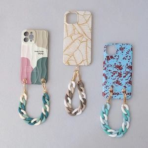 Colorful fishbone acrylic phone chain with retro resin links on assorted phone cases