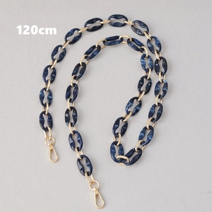 Detail view of 120cm blue marble acrylic bag chain strap with gold metal links and lobster clasps