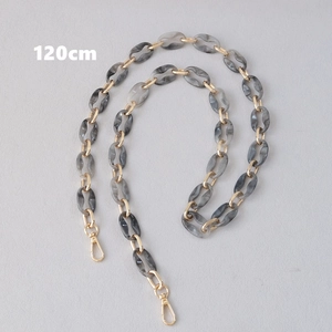 Close-up of 120cm mixed gold metal and gray marble resin links strap with lobster clasps