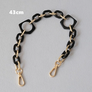 Detail view of 43cm chunky black resin acrylic chain with gold metal lobster clasps