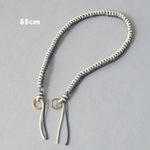 Detailed 65cm hand-woven wax rope bag strap with gold metal ring buckles in grey and cream