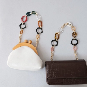 Fashion handbags with acrylic resin geometric chain straps and textured faux leather